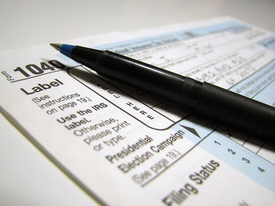 2481-closeup-of-a-1040-tax-form-and-a-pen-pv
